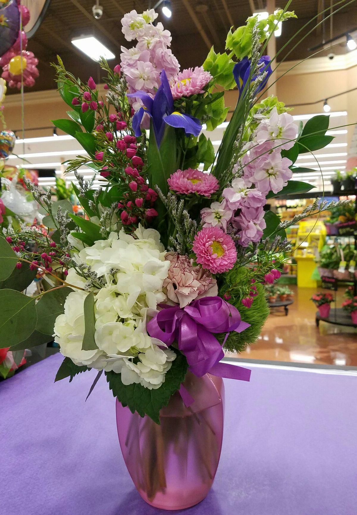 Hydrangea, green trick, iris, stock, carnation, bells of