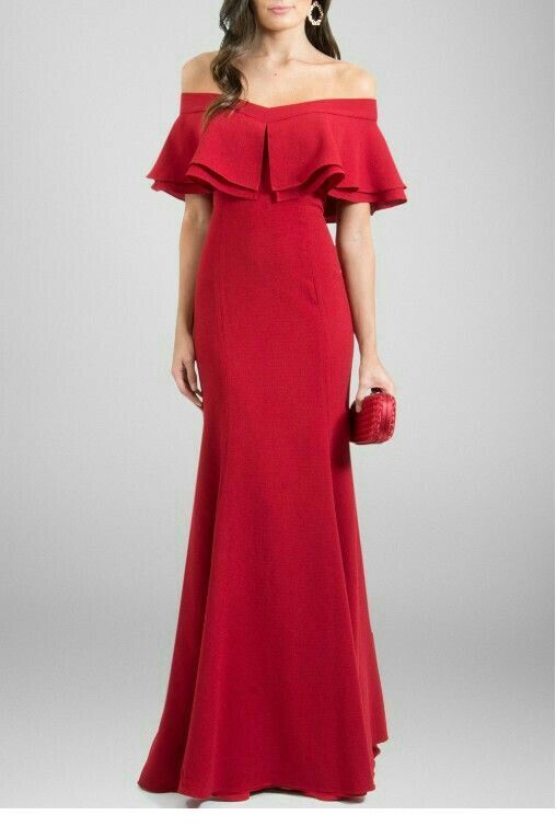 Red dress with ruffles and red bag