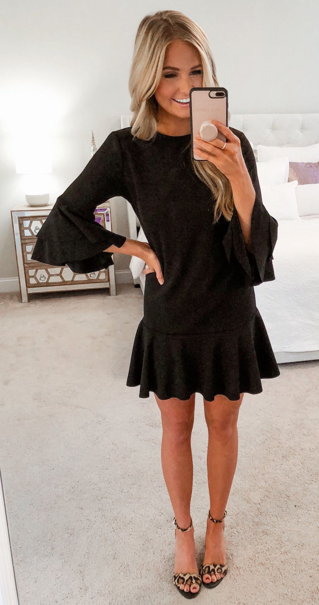 black crew-neck trumpet-sleeved dress