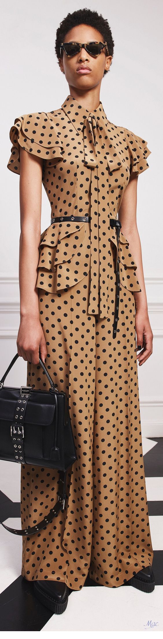 Long polka dot dress with black accessories