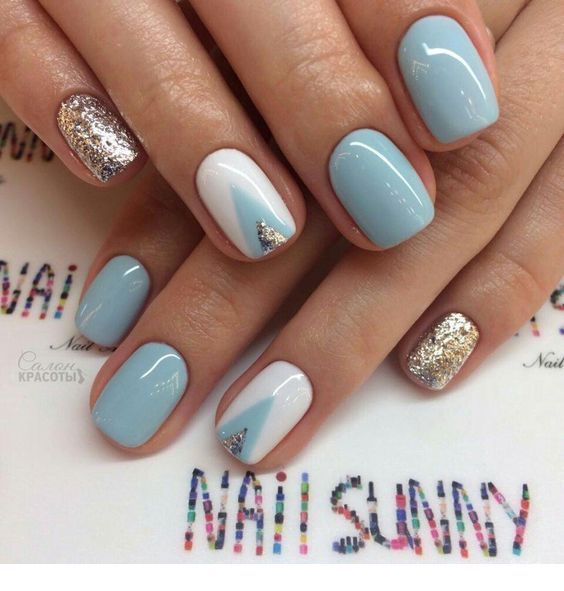 Nice light blue nails with silver glitter