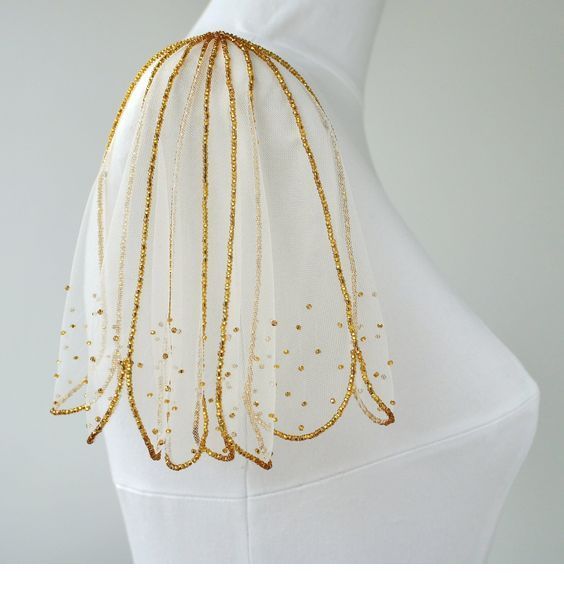 Nice gold glitter dress detail Nice gold glitter dress detail
