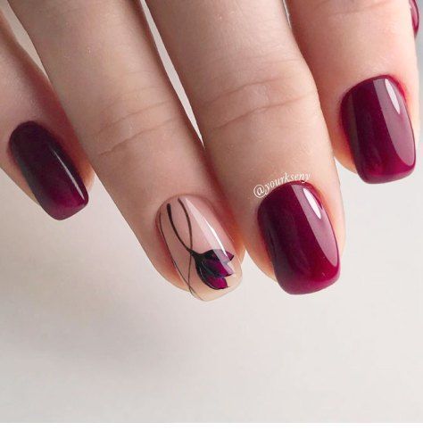Burgundy gel nails with a flower