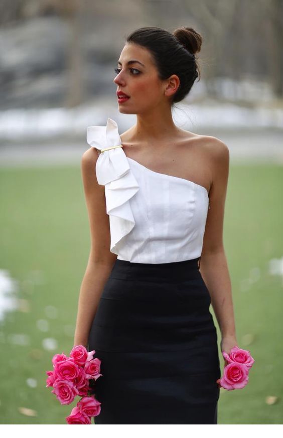 White top, black skirt and pink roses
