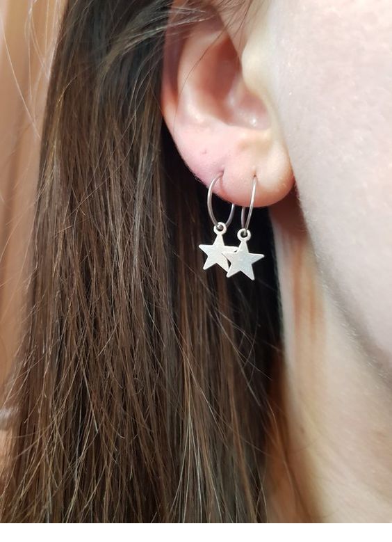 Two earrings with stars