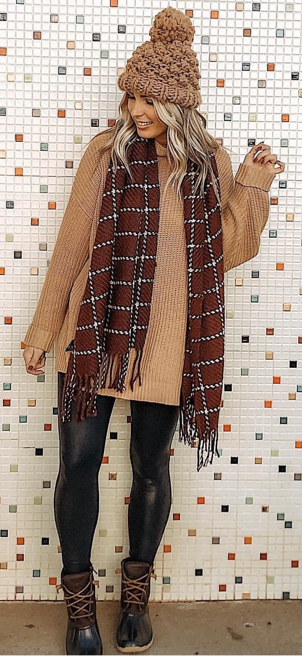 brown knit hat and coat