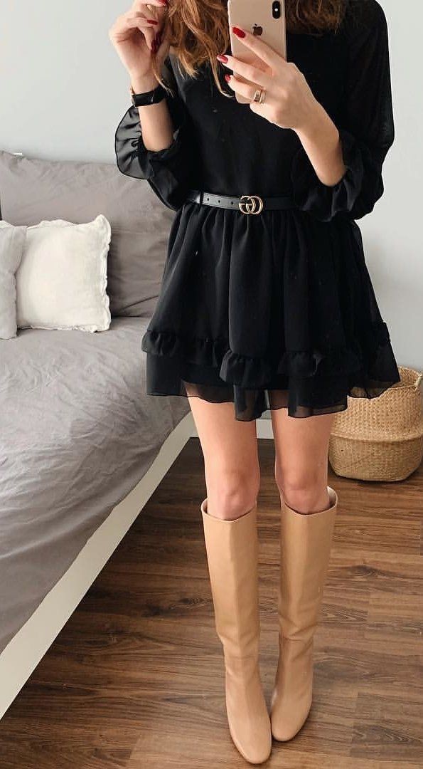 black long-sleeved mini dress and brown knee-high boots black long-sleeved mini dress and brown knee-high boots