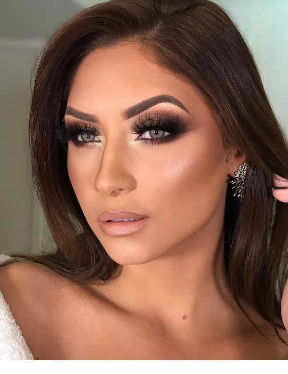 Sweet brown hair, glam makeup and earrings