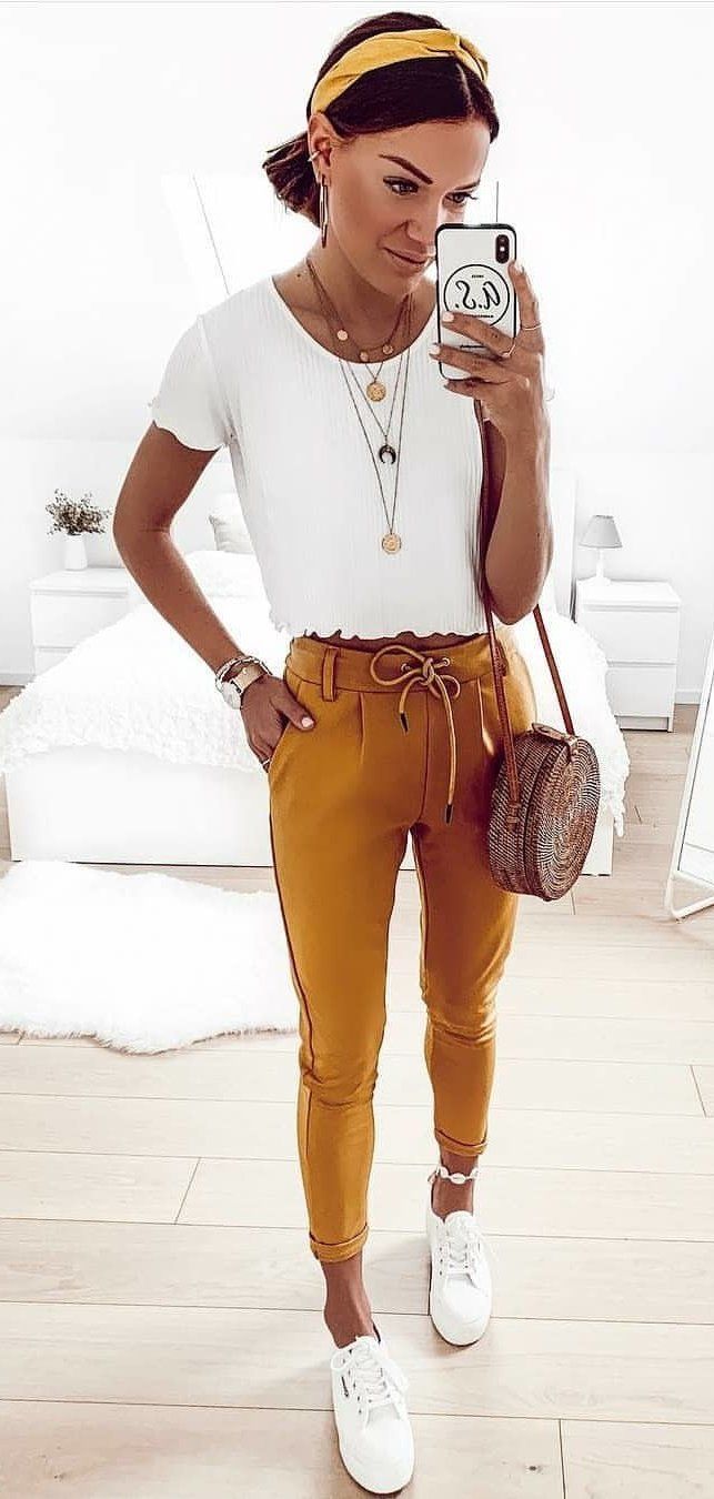 white scoop-neck cap-sleeved crop top and brown boyfriend jean #spring #outfits