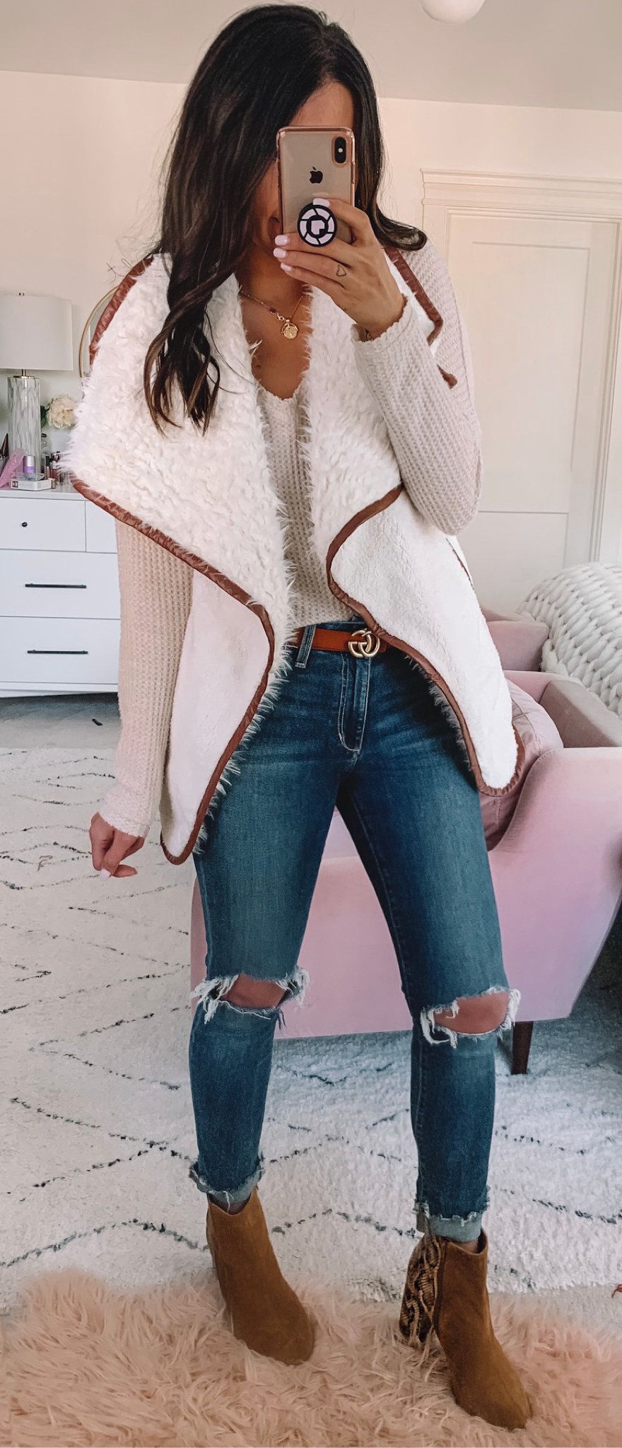 white and beige cardigan