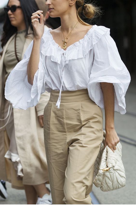 Large white shirt and brown pants
