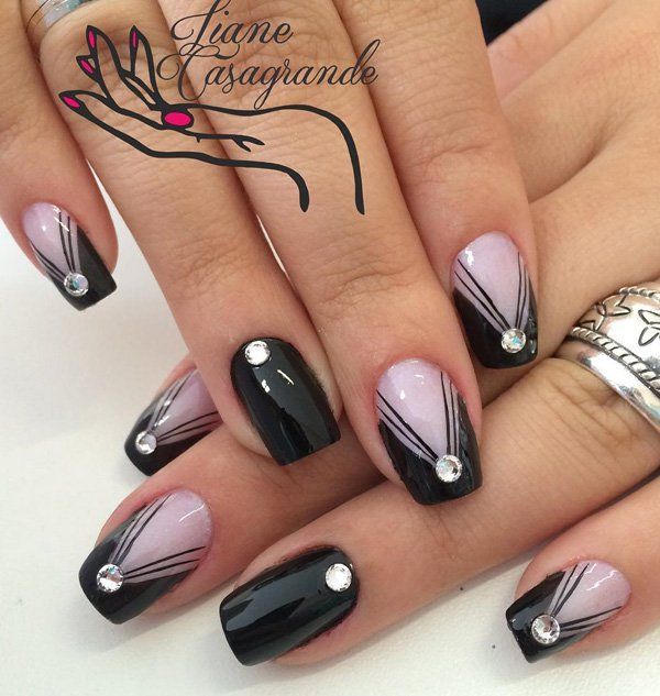 Beautiful black and periwinkle nail art design. Start off with a black and periwinkle base color then add the polishes alternately upstairs while adding the v-shape on the lighter nails.