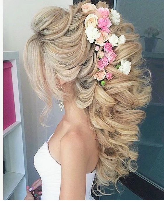 Amazing hairstyle with curls and flowers
