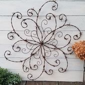 Wouldnt this barbed wire swirl add a bit of elegance to your rustic decor? Made ...