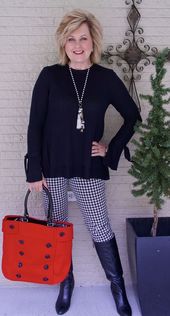 WEARING A BELL SLEEVE SWEATER - 50 IS NOT OLD