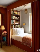 In a guest room, bed and canopy designed by Veere Grenney Assoc. Flohr picked up...