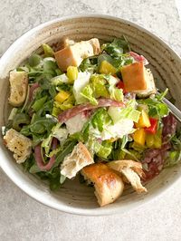 Italian Chopped Salad! Zesty, salty and full of flavor, this is the easiest salad to throw together. Packed with salami, romaine and more!