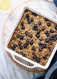 Blueberry Baked Oatmeal - - - pinner: good, but berries need to be tossed with some brown sugar before adding oat mixture; use 1/2 tsp fine sea salt not 3/4 tsp; I used fresh strawberries instead of blueberries, coconut oil instead of butter, & honey instead of maple syrup; pecans may be better added on top before sprinkling with raw(or even granulated) sugar (instead of toasting first & mixing in with oats - they lose their “toastiness” when baked in the wet mixture)
