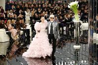 Lily-Rose Depp made her Chanel Couture debut in the coveted bridal position, on the arm of Karl Lagerfeld.Photo by Getty Images.