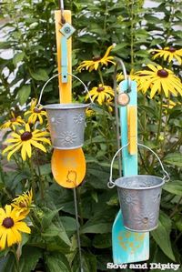Wooden spoon votive candles, re-purpose kitchen tools into garden art #recycledcrafts
