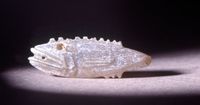 Chalcedony figure of a fish, probably a game-counter. Culture/period Roman Imperial. Date 1stC-2ndC