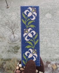 Check out this item in my Etsy shop https://www.etsy.com/ca/listing/1349572332/lilies-cross-stitch-bookmark-unique-gift