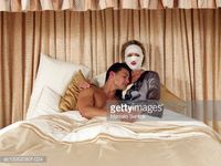 Stock Photo : Couple embracing in bed