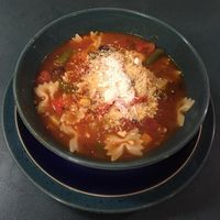 Fresh vegetables, beans, and elbow macaroni are simmered in a seasoned tomato broth creating a flavorful minestrone soup. Serve with garlic cheese bread and a fresh tossed green salad for a complete meal.