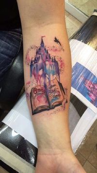 A Fairy tale book tattoo. Who don’t want a fairy tale in life? If you are among the fairy tale kind of a person, then this book tattoo is the best to try out.