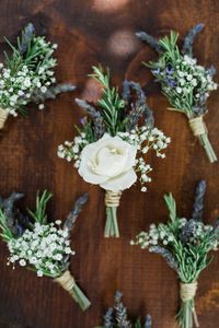groomsmen boutonnieres - photo by Casto Photography and Cinema - http://ruffledblog.com/eco-friendly-hawaiian-beach-wedding