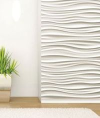 A white textured wall against a plain wall.
