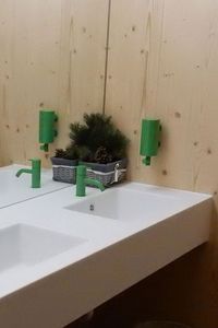 Combine the original VOLA colour Light Green with natural materials for a cozy scandinavian feeling. VOLA HV1 tap and T10JR Soap dispenser in colour 06 Light Green. Architecht: Gerald Cappek, München. Project: Höllertalangerhütte, Germany. #bathroom #kitchen #color #ideas #modern #coloured #tap #VOLA #design #luxury #handmade #elegant #inspiration #ArneJacobsen #lightgreen #greenbathroom
