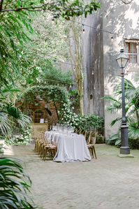 Our seated dinner in the New Orleans Pharmacy Museum courtyard in the French Quarter, micro wedding with Leaf + Petal NOLA www.leafandpetalnola.com