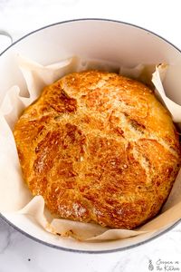 This No Knead Bread (Dutch Oven Bread) is my favourite go to bread recipe! It's incredibly easy to make, with a beautiful golden crust. It's soft and fluffy on the inside and takes ridiculously delicious. It only takes 2 hours to rise and requires no special ingredients!