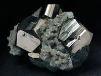 Pyrite, Kurzhunkul', Kostanay, Kostanay Province, Kazakhstan. Old specimen of pyrite crystals on matrix rock. Size 58 х 42 х 31 mm. Collection/Copyright: pegmatite