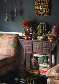 If you are a maximalist like me, then bring in all that you have. Hanging diyas, lanterns, statues, etc. Layer it in varying heights and you have got yourself, a one of a kind display for the festive season. Image courtesy, Sruthi Singh