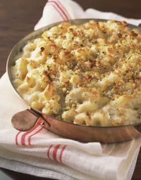 This French macaroni and cheese recipe features macaroni, crème fraiche, and Gruyere, Cantal, or cheddar cheese. French-style macaroni and cheese.