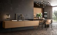 Havana gres Mutina | Thermo-treated oak and black aluminum frame bronze glass | Thermo-treated oak | Worktop: Mutina | Snack table: thermo-treated oak | Plinth: urban
