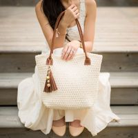 Crochet this beautifully textured Star Stitch Purse with a flat base! Free pattern available with both crochet and leather handle options!