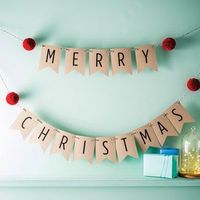 Merry Christmas Bunting With Pom Poms. Discover stylish, personal and wonderfully unique Christmas decorations to turn your home into a festive wonderland.