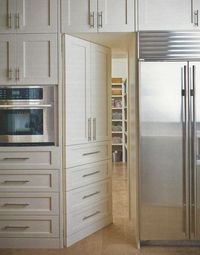Door to Pantry hidden in cabinetry