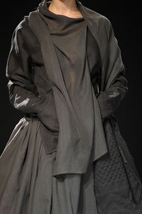 like the idea of pieces streaming down, vertically. also the quilting (lower right), adding texture __ Yohji Yamamoto -- spring 2012