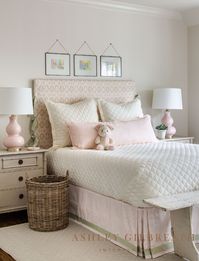 ASHLEY GILBREATH INTERIOR DESIGN: Somehow pink can almost act as a neutral in this space. The soft blush and pink undertones in this big girl room are everywhere: the pink gourd lamps, the blush long lumbar pillow and bedskirt, even the fun pink print slipcover headboard.