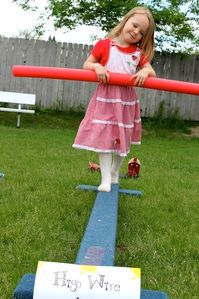 Fun circus birthday party games you can DIY or buy! Great ideas for kids that are also fun for adults! Go beyond ring toss and face painting with these free printable games, DIY games, and more!
