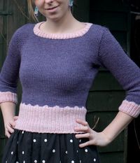 Free Knitting Pattern for Scalloped Sweater - Cropped sweater features color-blocking with scalloping at the waist and cuffs and elbow-length sleeves in worsted weight. Designed by Andi Satterlund. XS (S, M, L, 1X, 2X, 3X). Pictured project by ela-sews