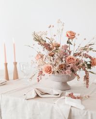 Create your own stunning fall wedding centerpieces with high-quality silk flowers and faux greenery. Choose this soft color palette, or explore the other color combinations for your fall wedding. Shop for everything you need at Afloral.com.