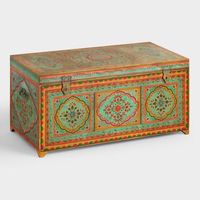 Keep blankets, books and other essentials tucked away in our large wooden trunk, handcrafted in India with intricate medallion motifs painted in striking teal.
