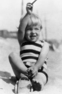 Norma Jeane on the beach of Santa Monica, 1928.