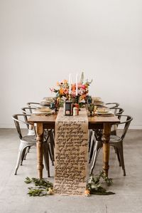 It doesn't get much more romantic than having the lyrics to John Legend's "All Of Me" written in calligraphy on your table runner | Image by Carrie J Photography