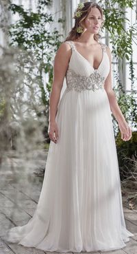 Featured Dress: Maggie Sottero; Wedding dress idea.